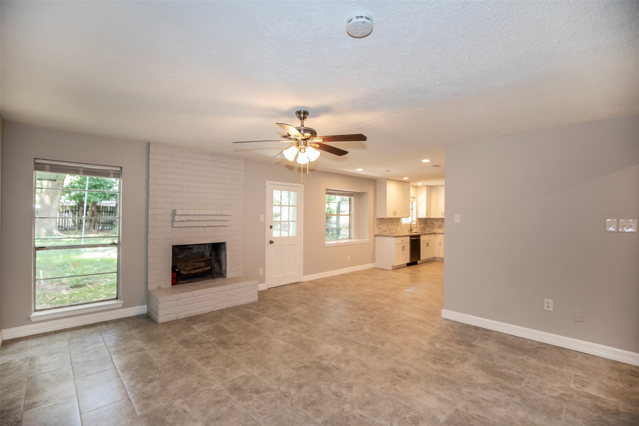 802 Wavecrest Lane Houston, TX 77062 - Photo 9 of 32 The family room has a large window with a fantastic view of the backyard.