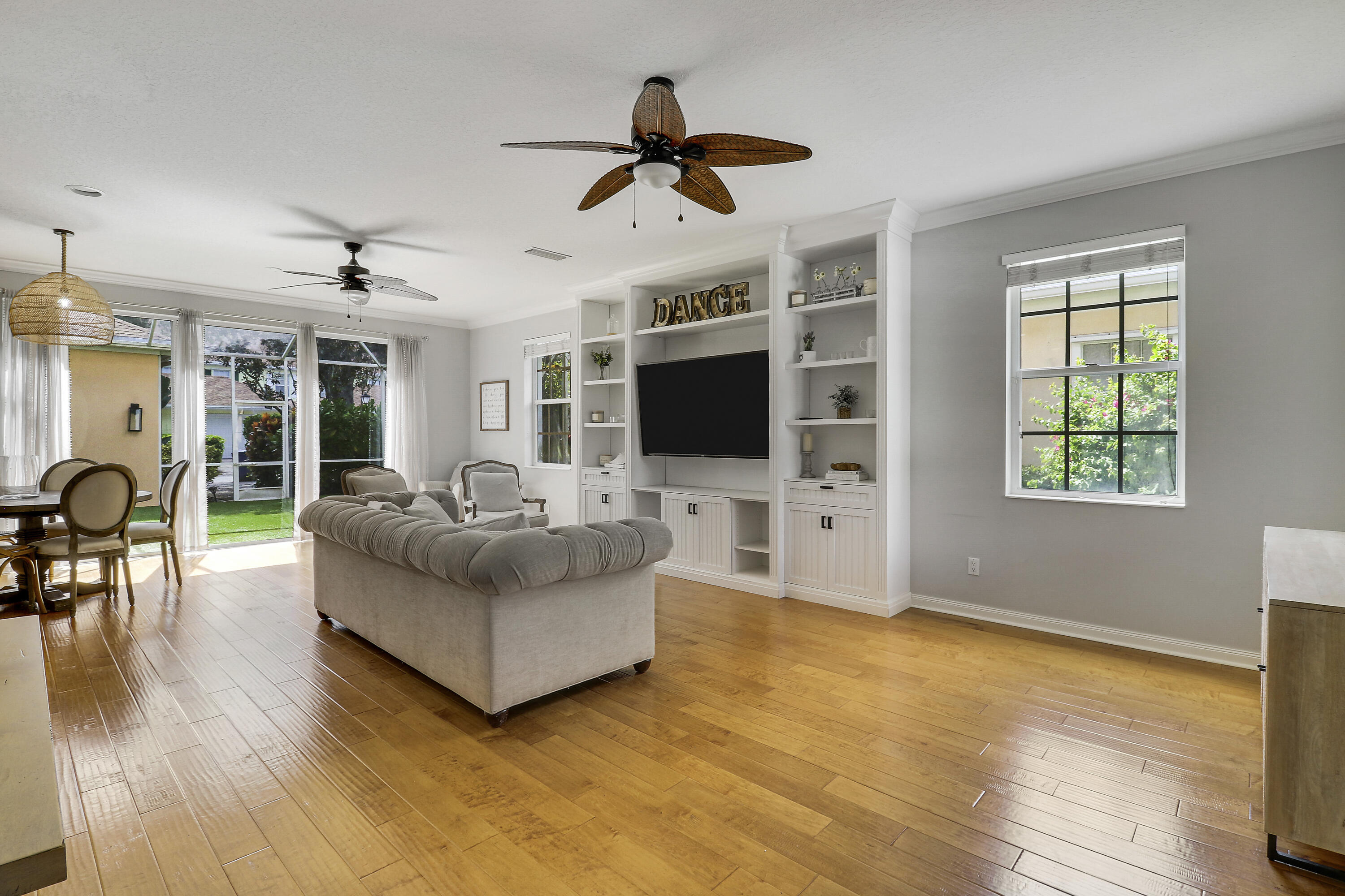 131 Rockingham Road Jupiter, FL 33458 - Photo 14 of 40 a living room with furniture and a flat screen tv