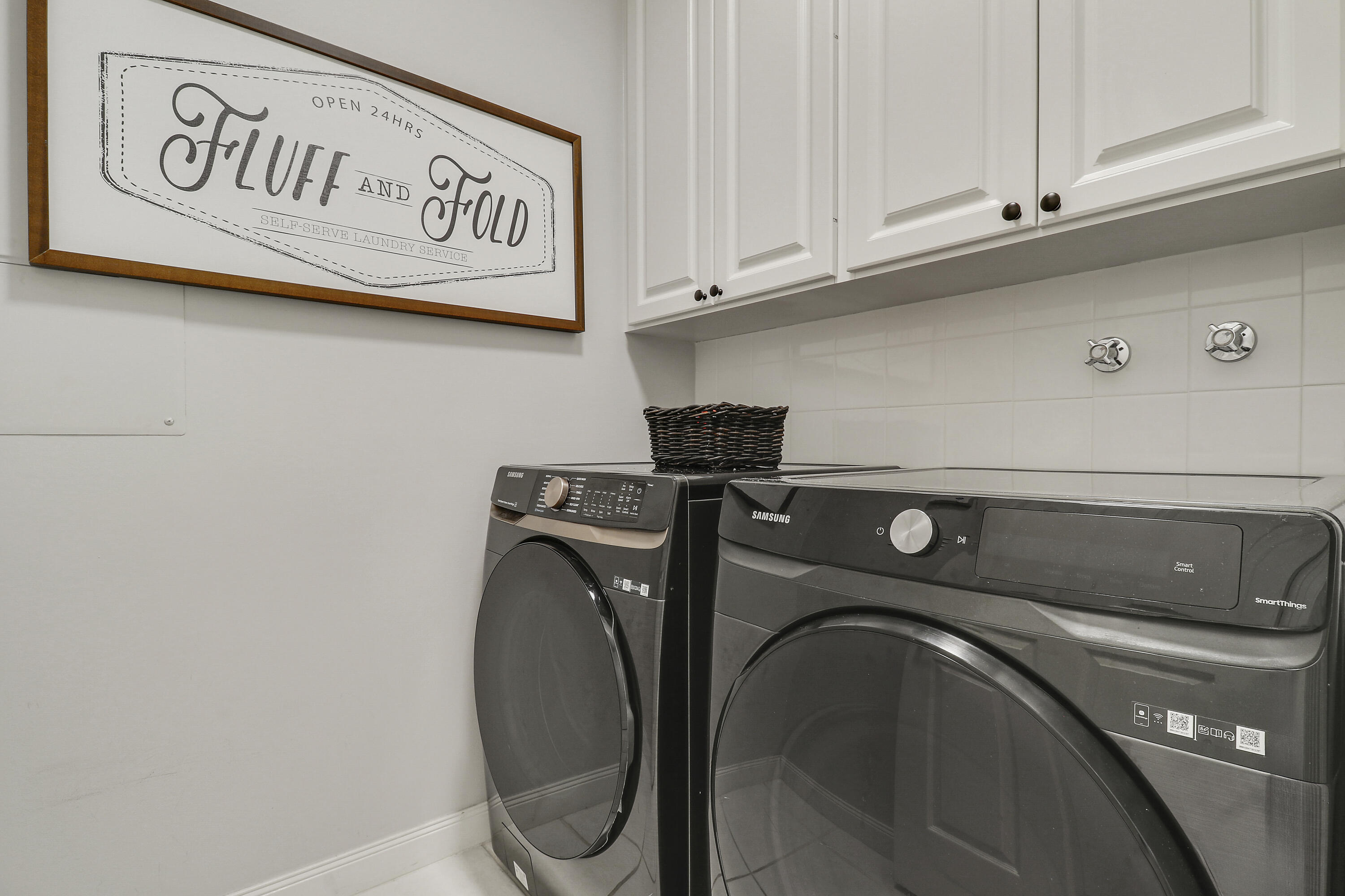 131 Rockingham Road Jupiter, FL 33458 - Photo 22 of 40 a utility room with dryer and washer
