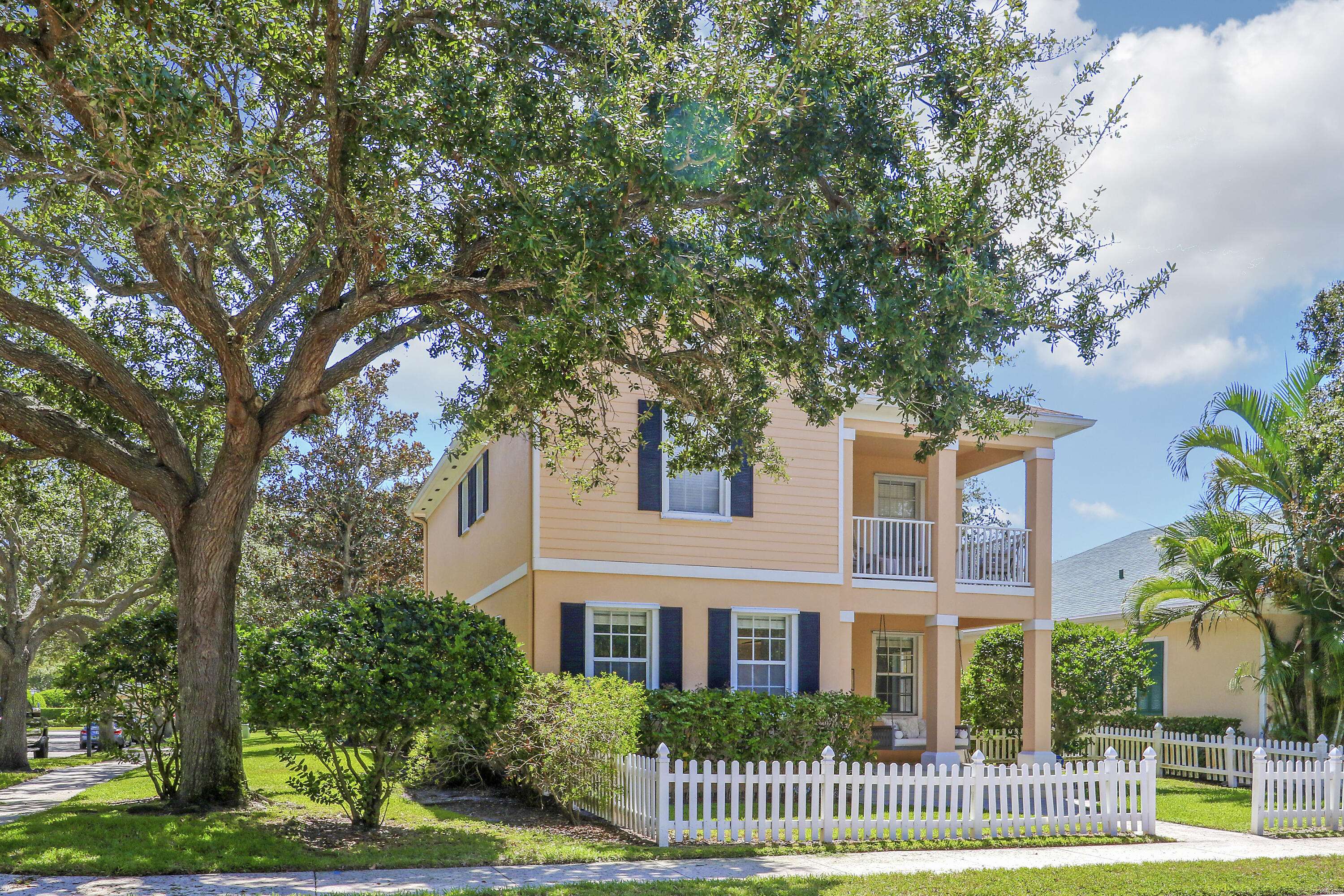131 Rockingham Road Jupiter, FL 33458 - Photo 40 of 40 front view of a house with a yard