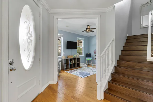a view of living room and workspace