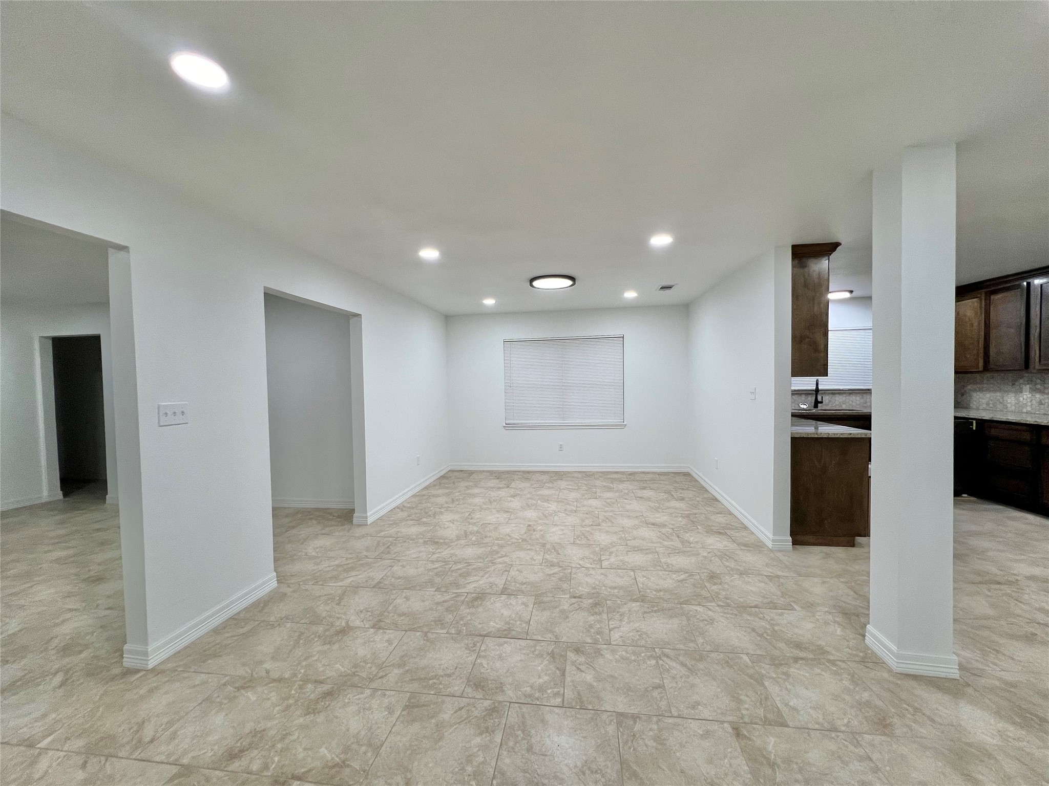5 Colony Drive Angleton, TX 77515 - Photo 13 of 34 a view of a kitchen with a sink and a refrigerator