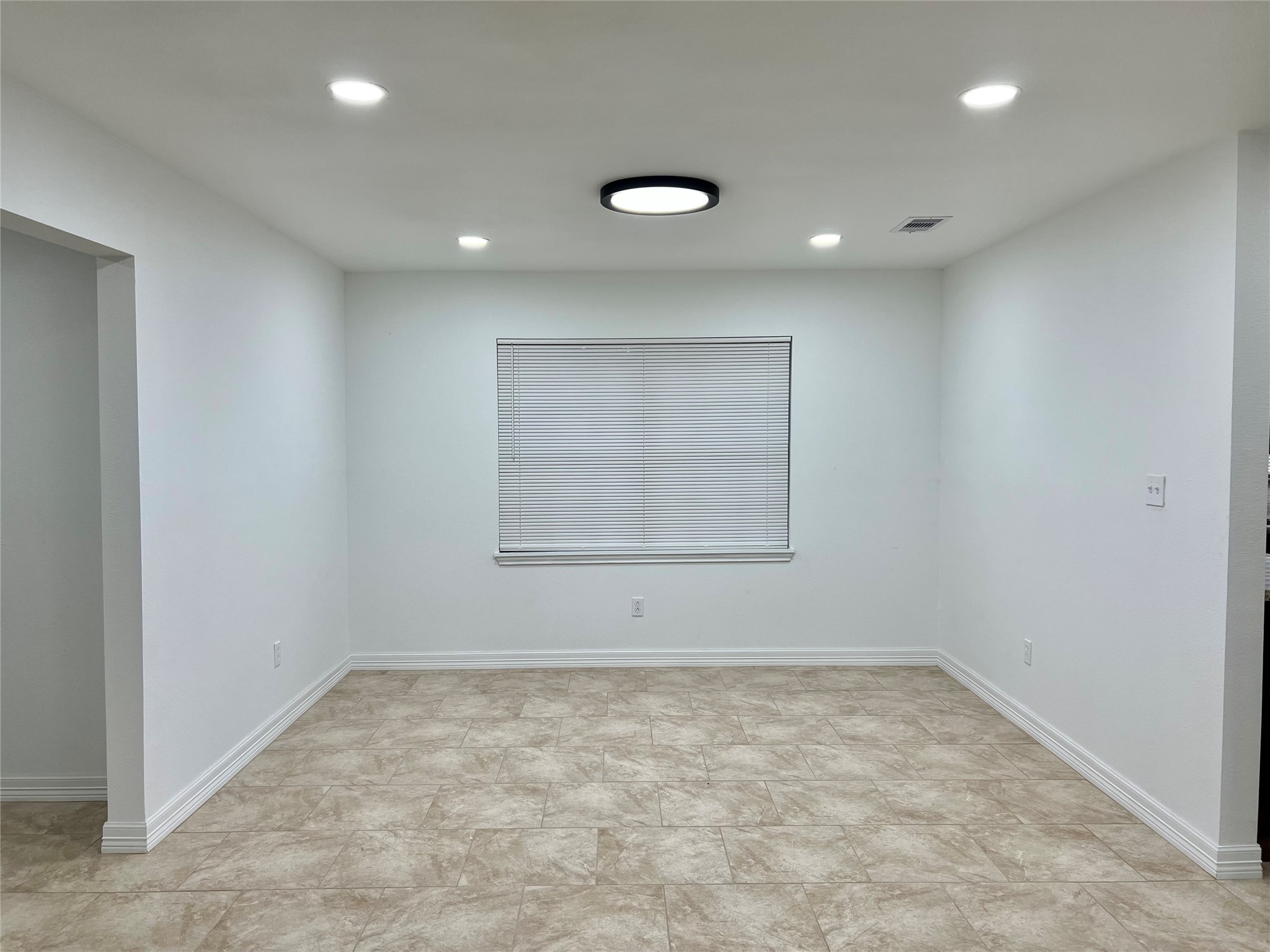 5 Colony Drive Angleton, TX 77515 - Photo 14 of 34 an empty room with a empty space and window