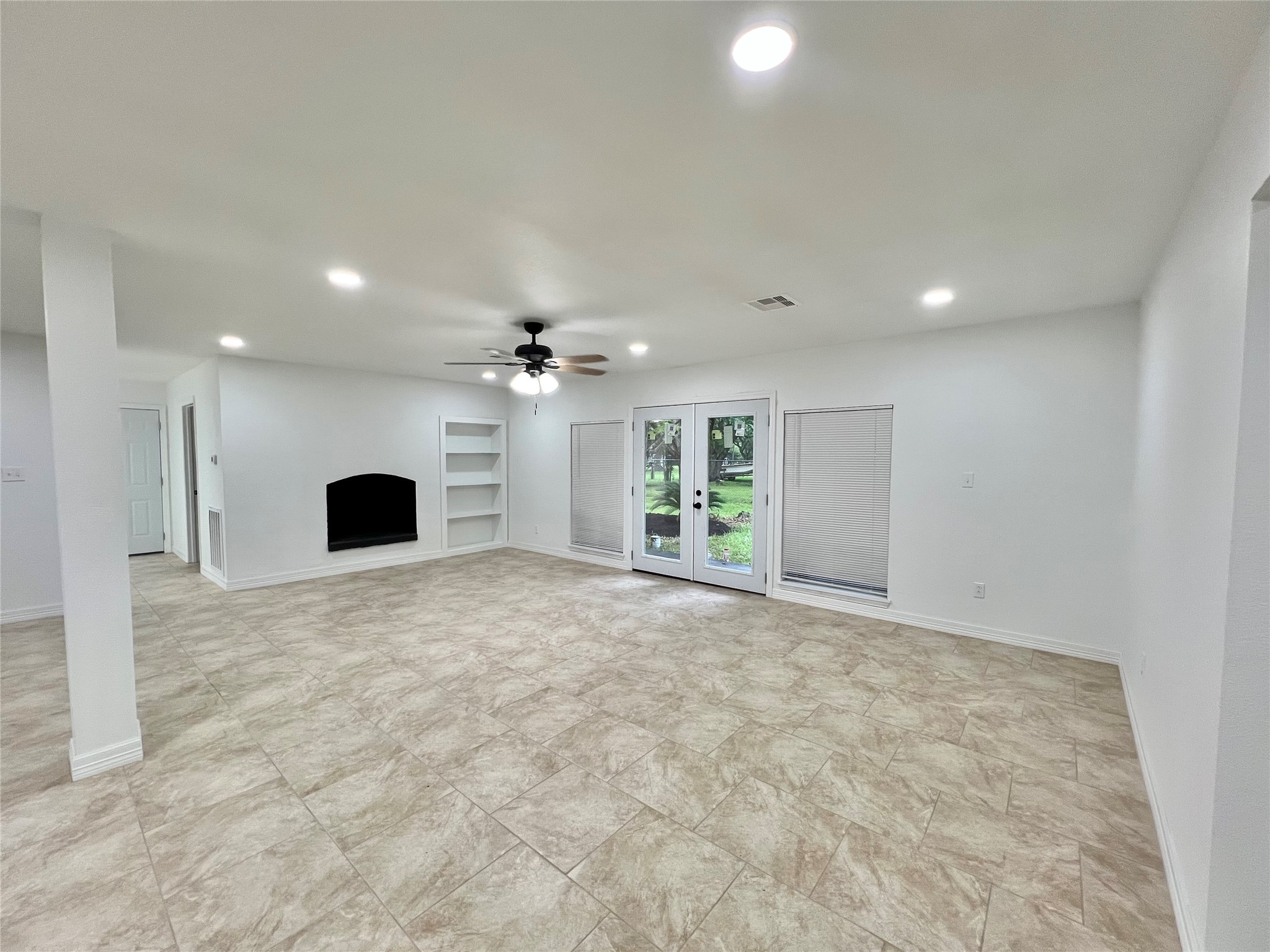 5 Colony Drive Angleton, TX 77515 - Photo 15 of 34 a view of a kitchen with a sink and a refrigerator
