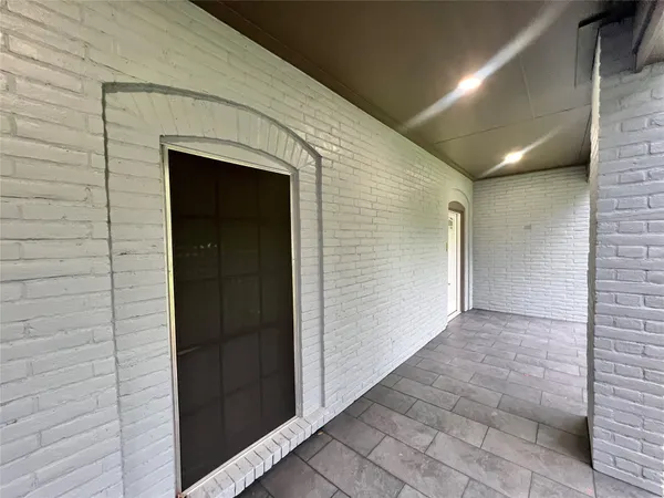 a view of hallway with stairs