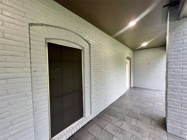 a view of hallway with stairs