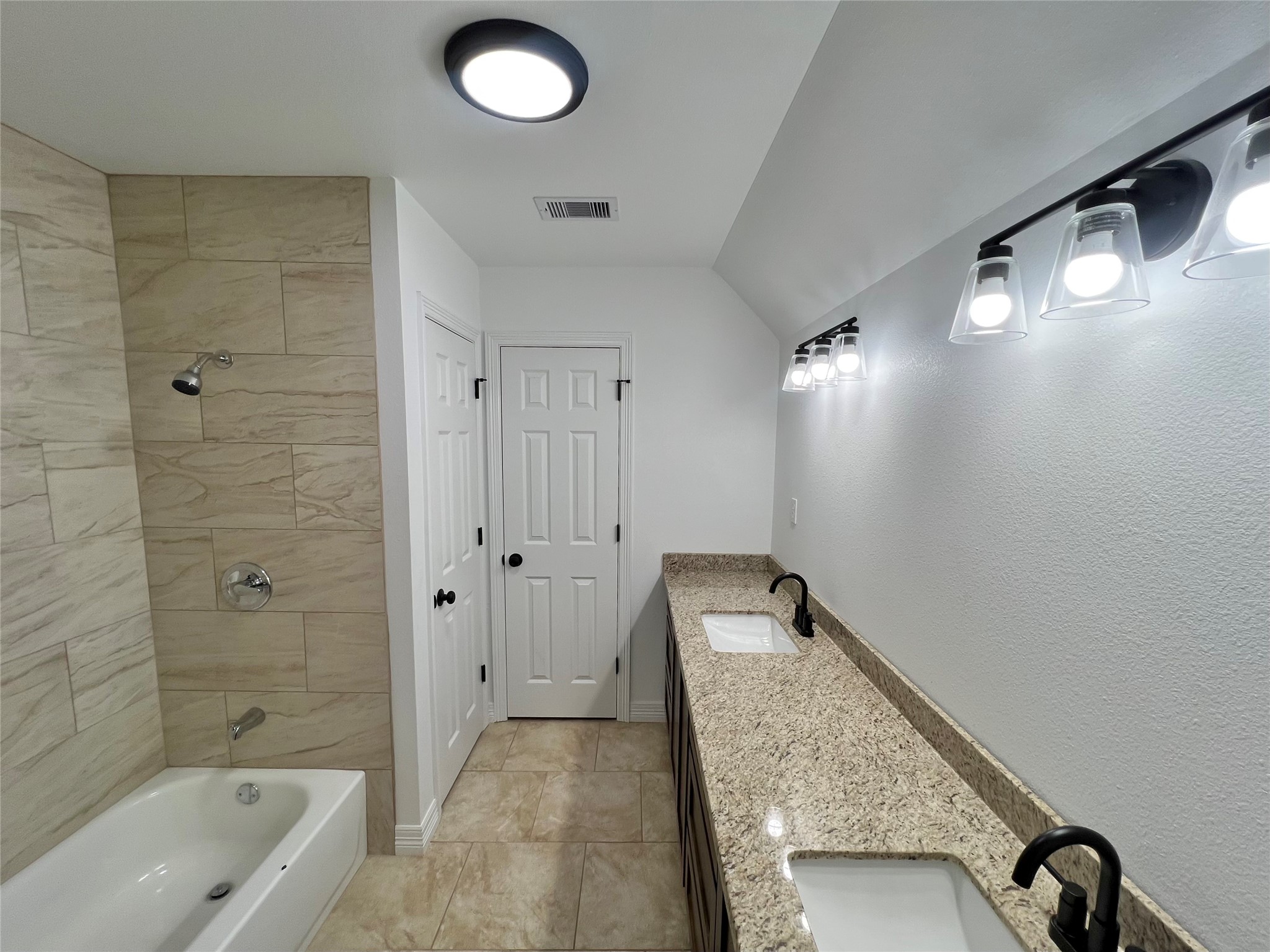 5 Colony Drive Angleton, TX 77515 - Photo 29 of 34 a bathroom with a granite countertop sink a toilet and shower