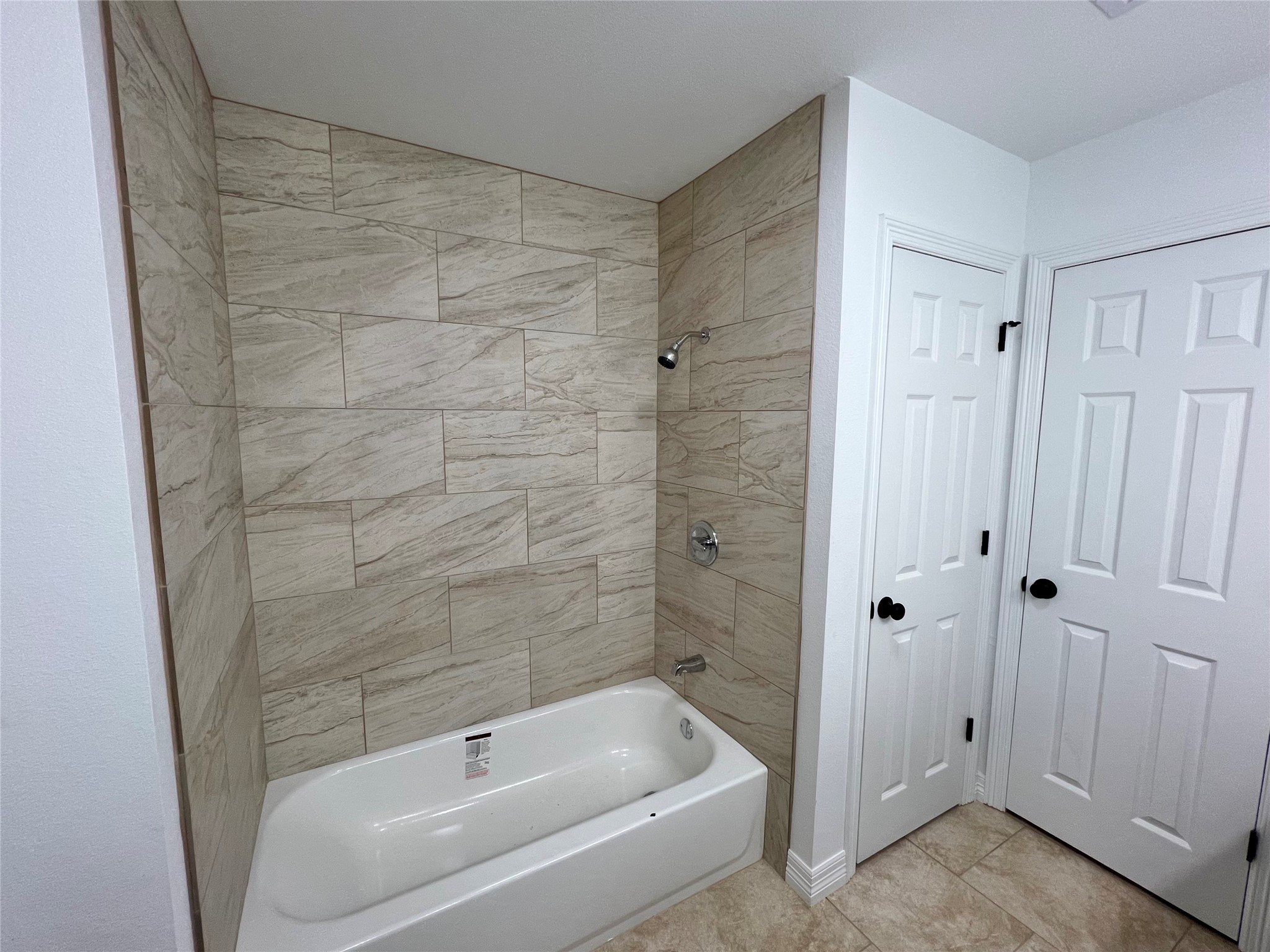 5 Colony Drive Angleton, TX 77515 - Photo 30 of 34 a bathroom with a bathtub and shower