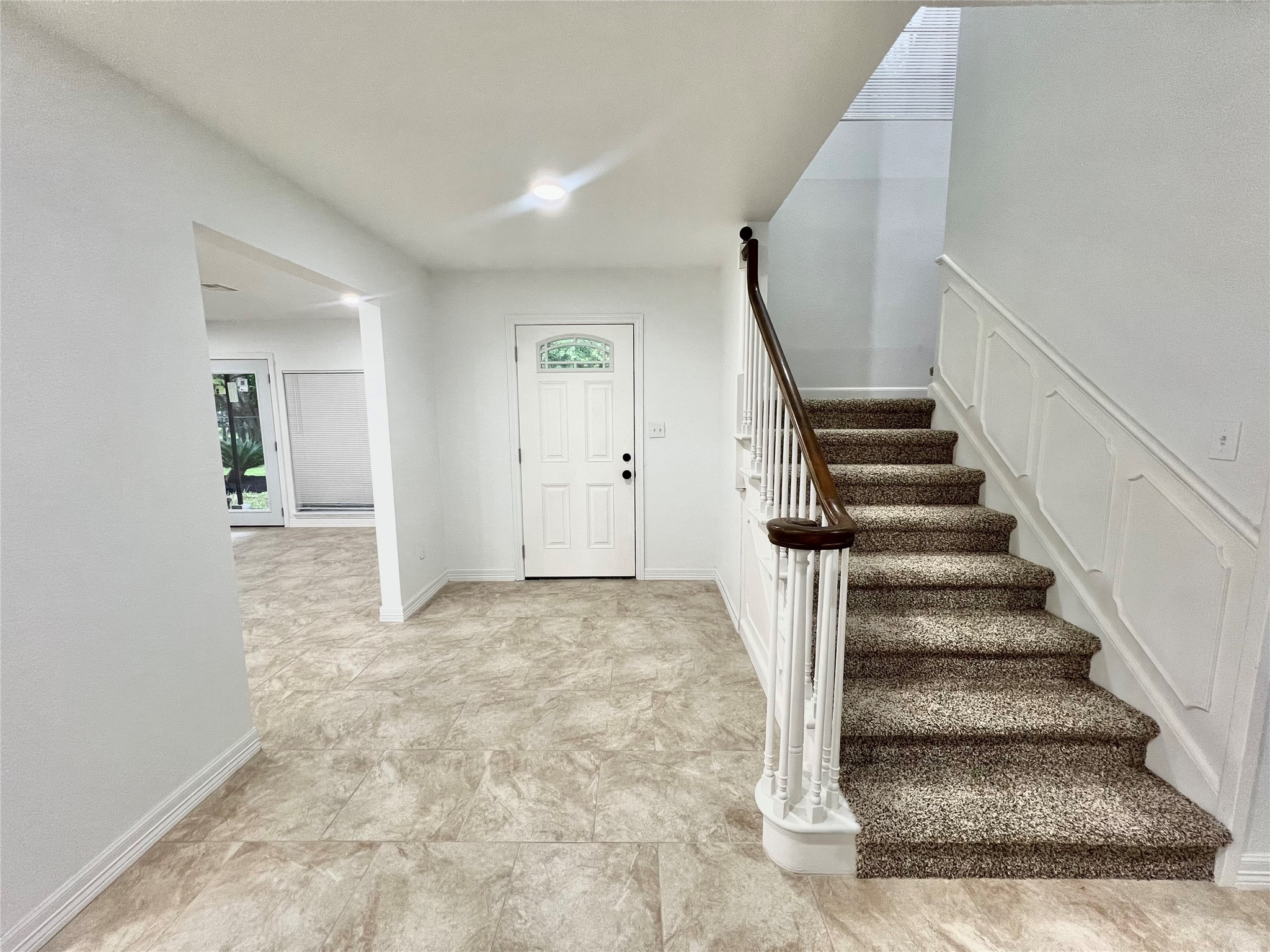 5 Colony Drive Angleton, TX 77515 - Photo 3 of 34 a view of entryway and hall with wooden floor