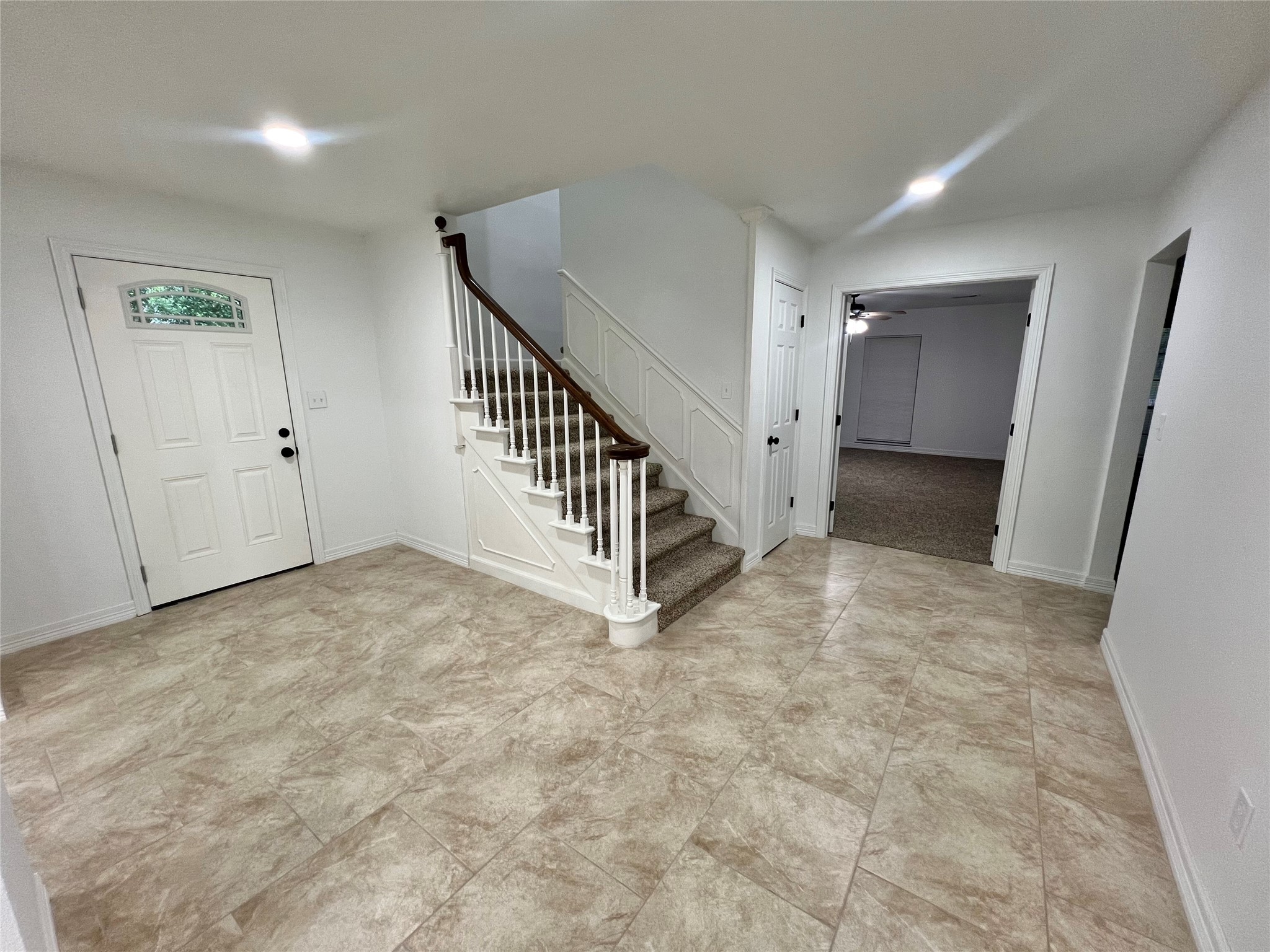 5 Colony Drive Angleton, TX 77515 - Photo 4 of 34 a view of a hallway with staircase