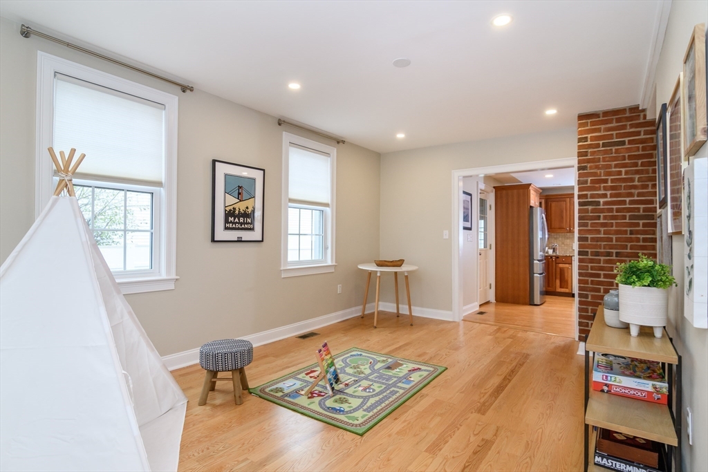 4 Willow Street Natick, MA 01760 - Photo 11 of 24 a living room with furniture and a rug