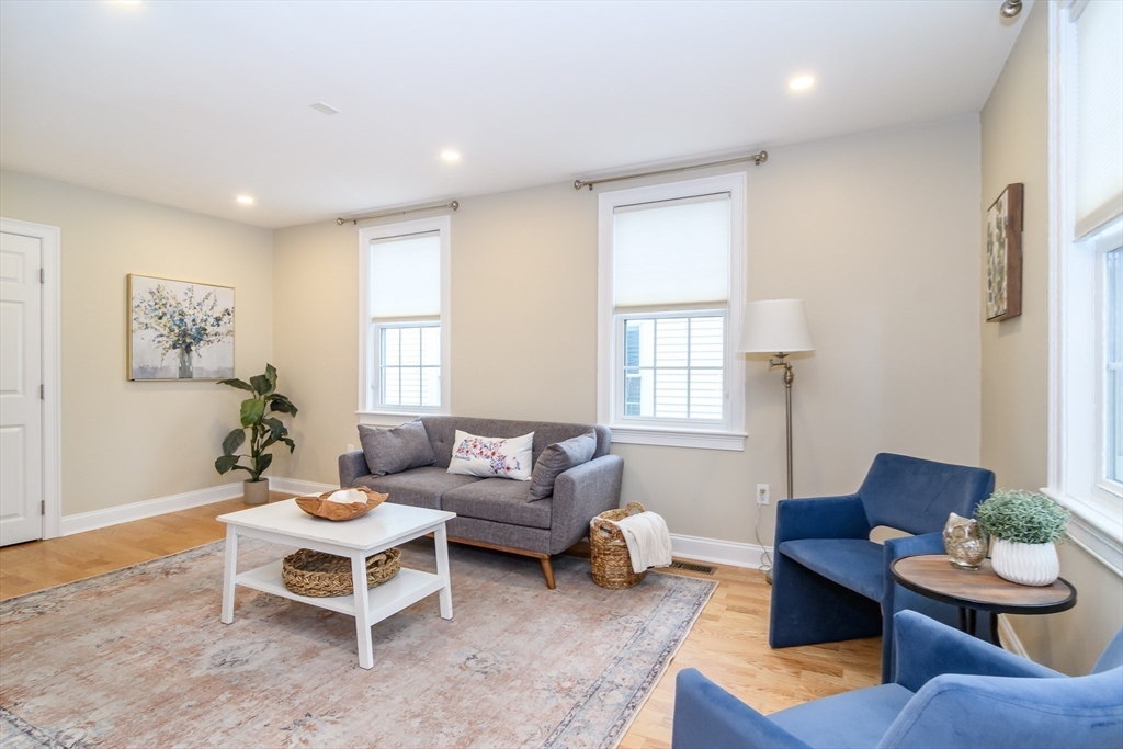 4 Willow Street Natick, MA 01760 - Photo 14 of 24 a living room with furniture and a window