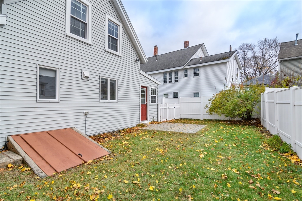 4 Willow Street Natick, MA 01760 - Photo 23 of 24 a view of a house with backyard and a window