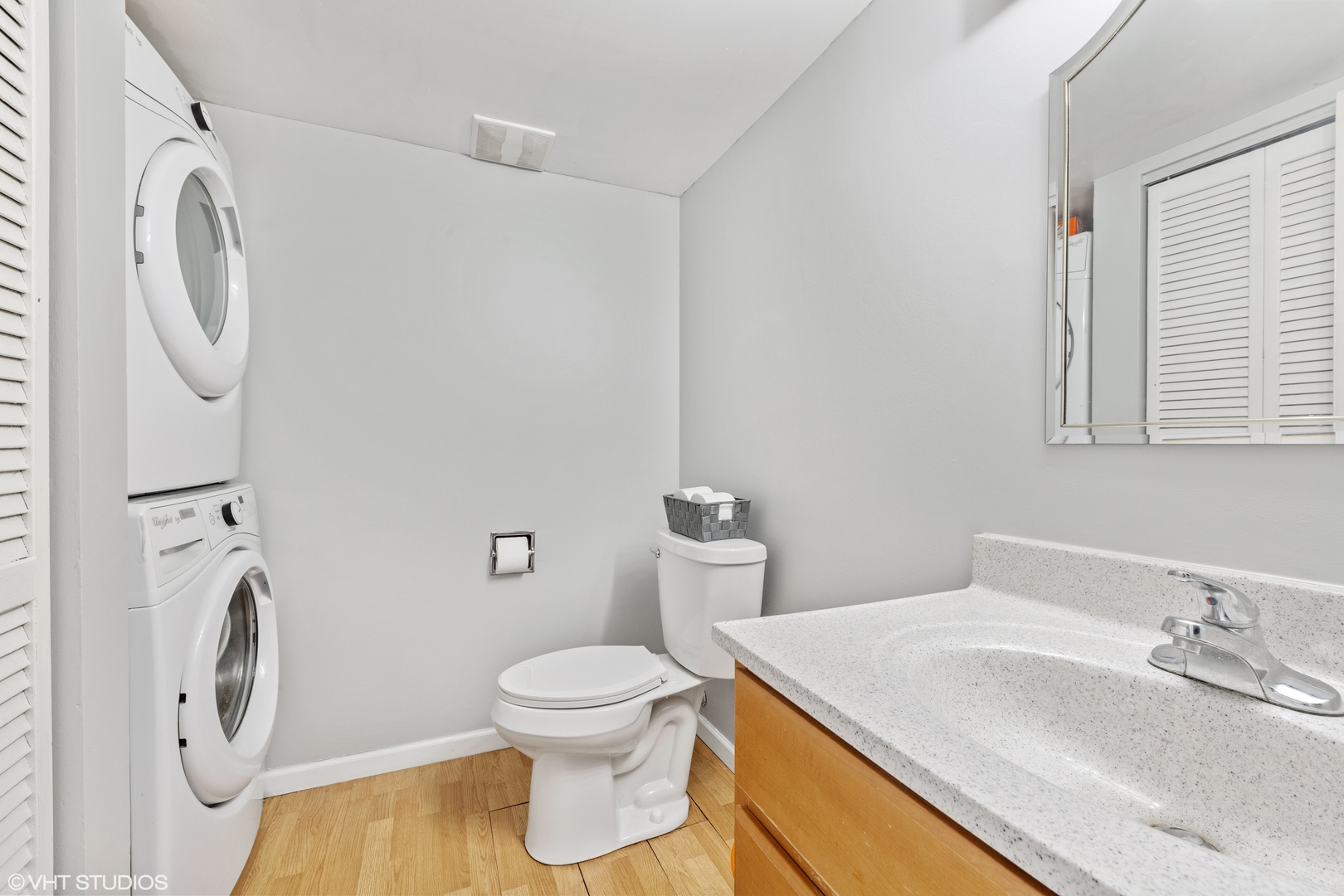 314 Rodenburg Road Roselle, IL 60172 - Photo 11 of 13 a white toilet sitting next to a bathroom sink