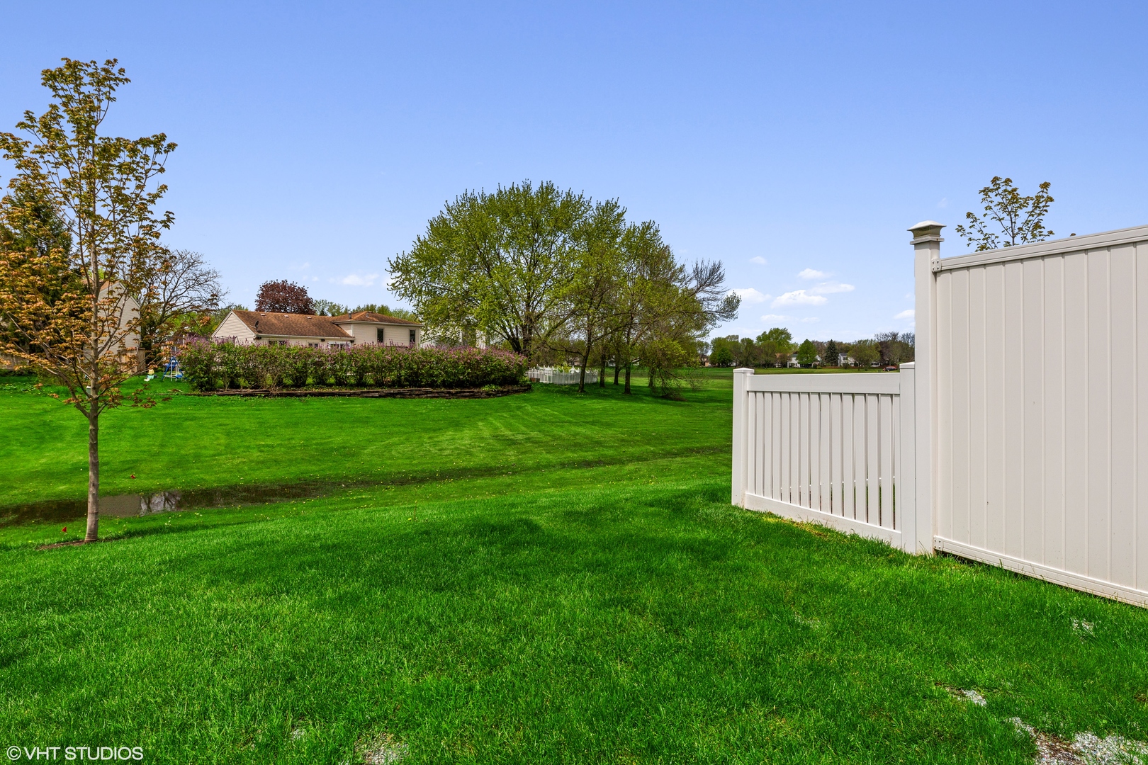 314 Rodenburg Road Roselle, IL 60172 - Photo 12 of 13 a view of a house with a yard and sitting area