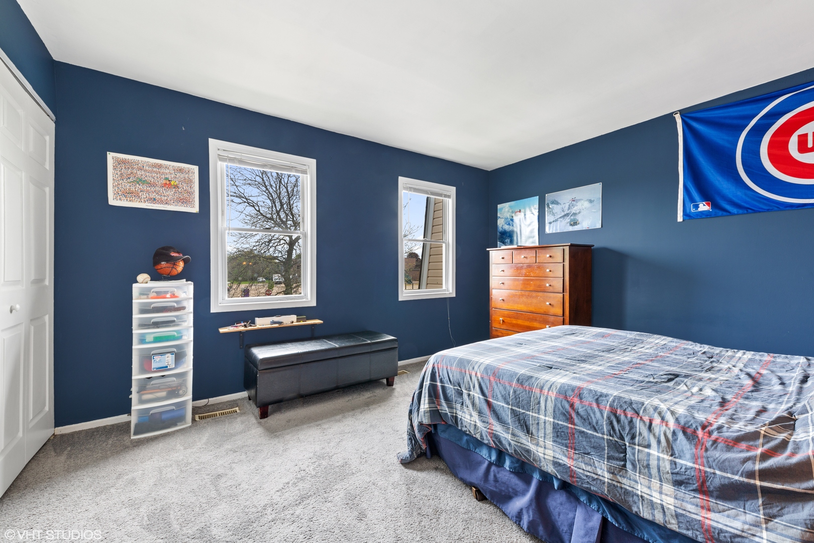 314 Rodenburg Road Roselle, IL 60172 - Photo 7 of 13 a bedroom with a bed and dresser
