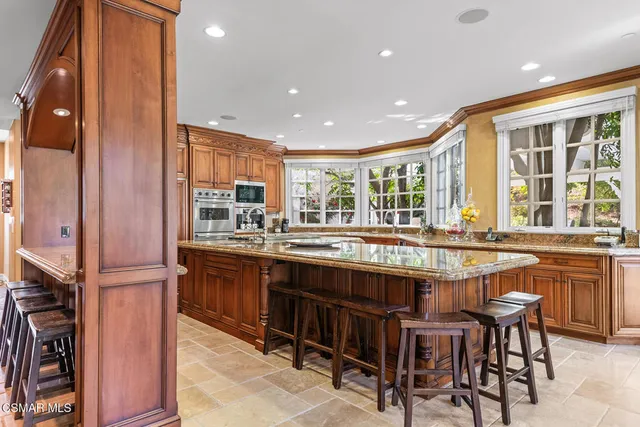 a view of a porch with seating space