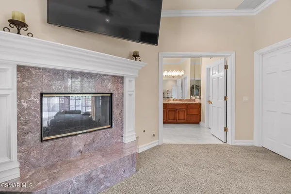 a view of a porch with a tv