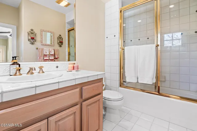 a view of a house with backyard porch and sitting area