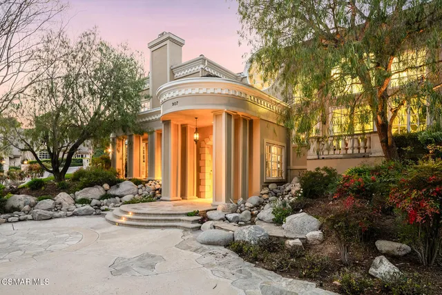 a view of balcony with furniture