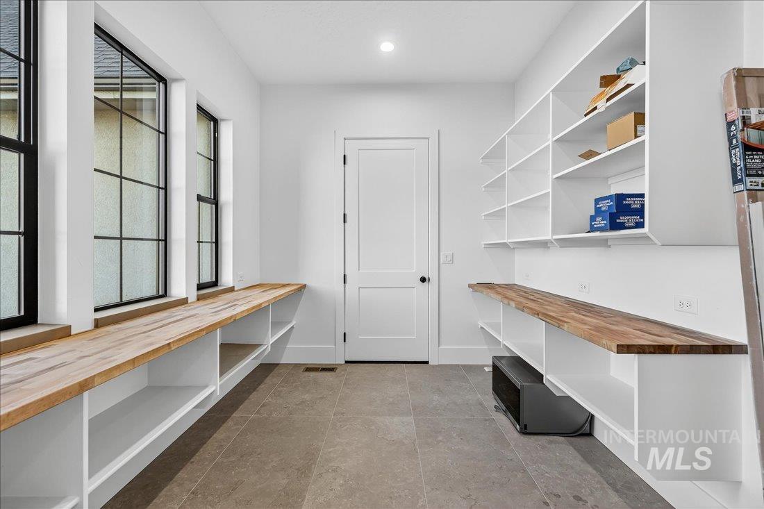 665 Watkins Street Middleton, ID 83644 - Photo 9 of 34 Mudroom with recessed lighting and light tile patterned floors