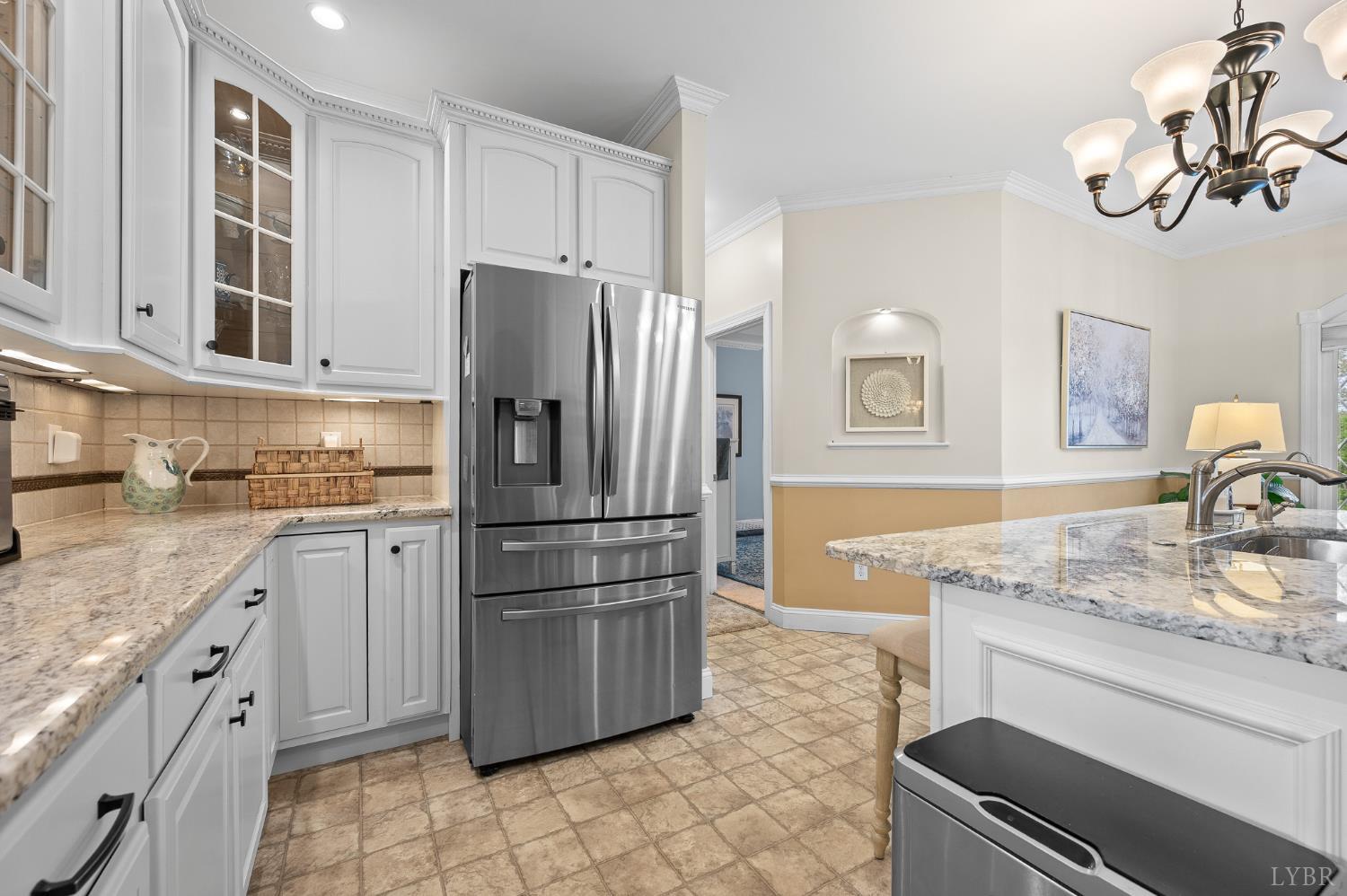 200 North Branch Road Bedford, VA 24523 - Photo 13 of 52 a kitchen with granite countertop a refrigerator a stove a sink and dishwasher
