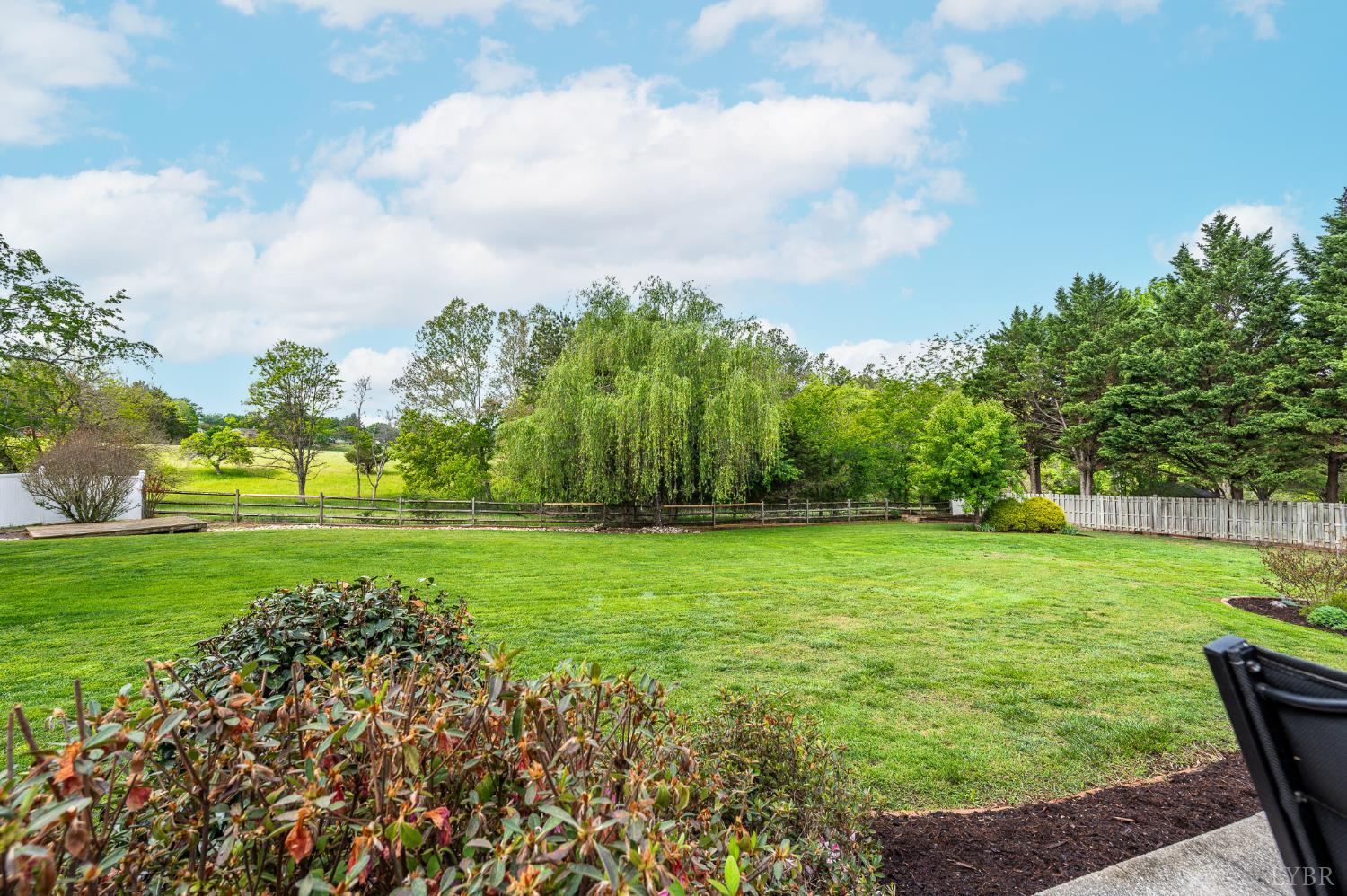 200 North Branch Road Bedford, VA 24523 - Photo 46 of 52 a view of a garden with a building in the background