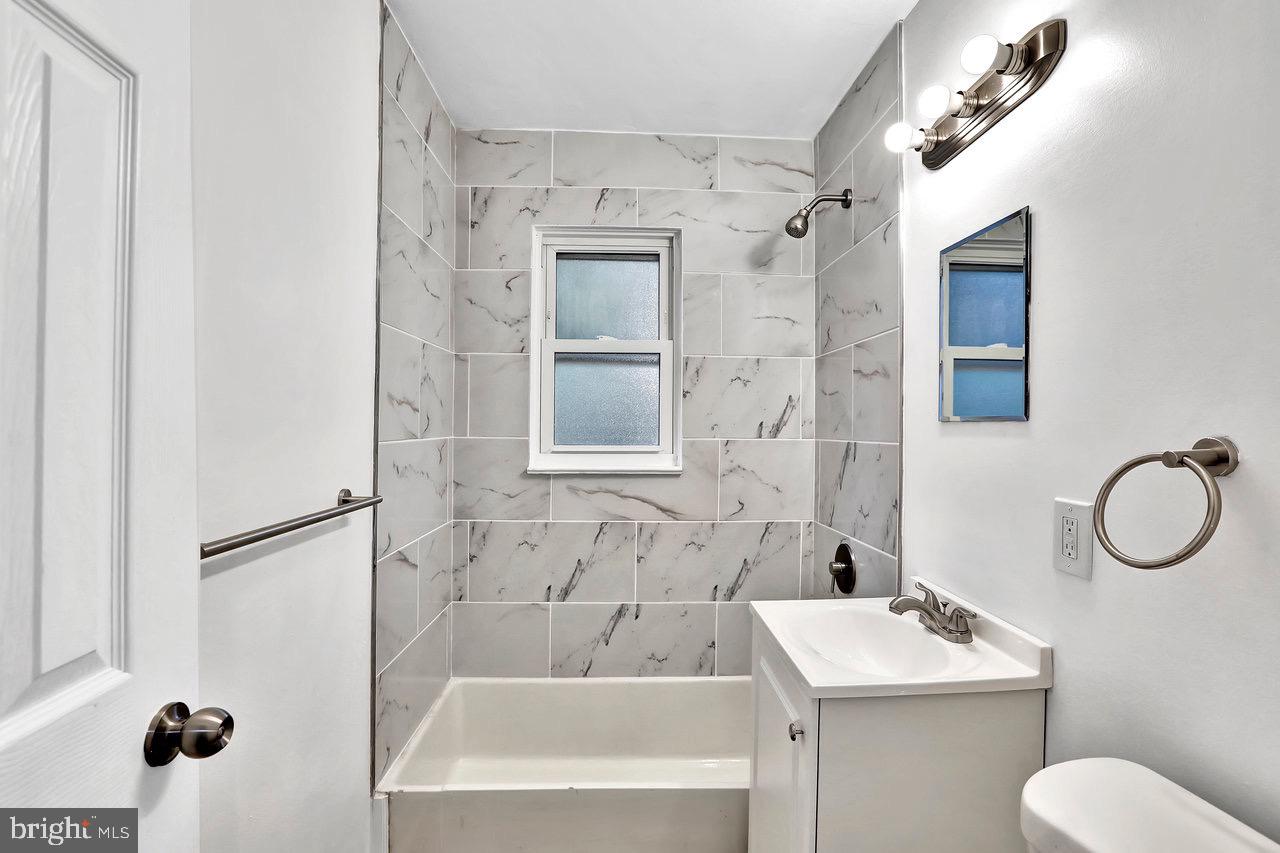 331 Oakland Street Ewing, NJ 08618 - Photo 12 of 21 a bathroom with a sink toilet and shower