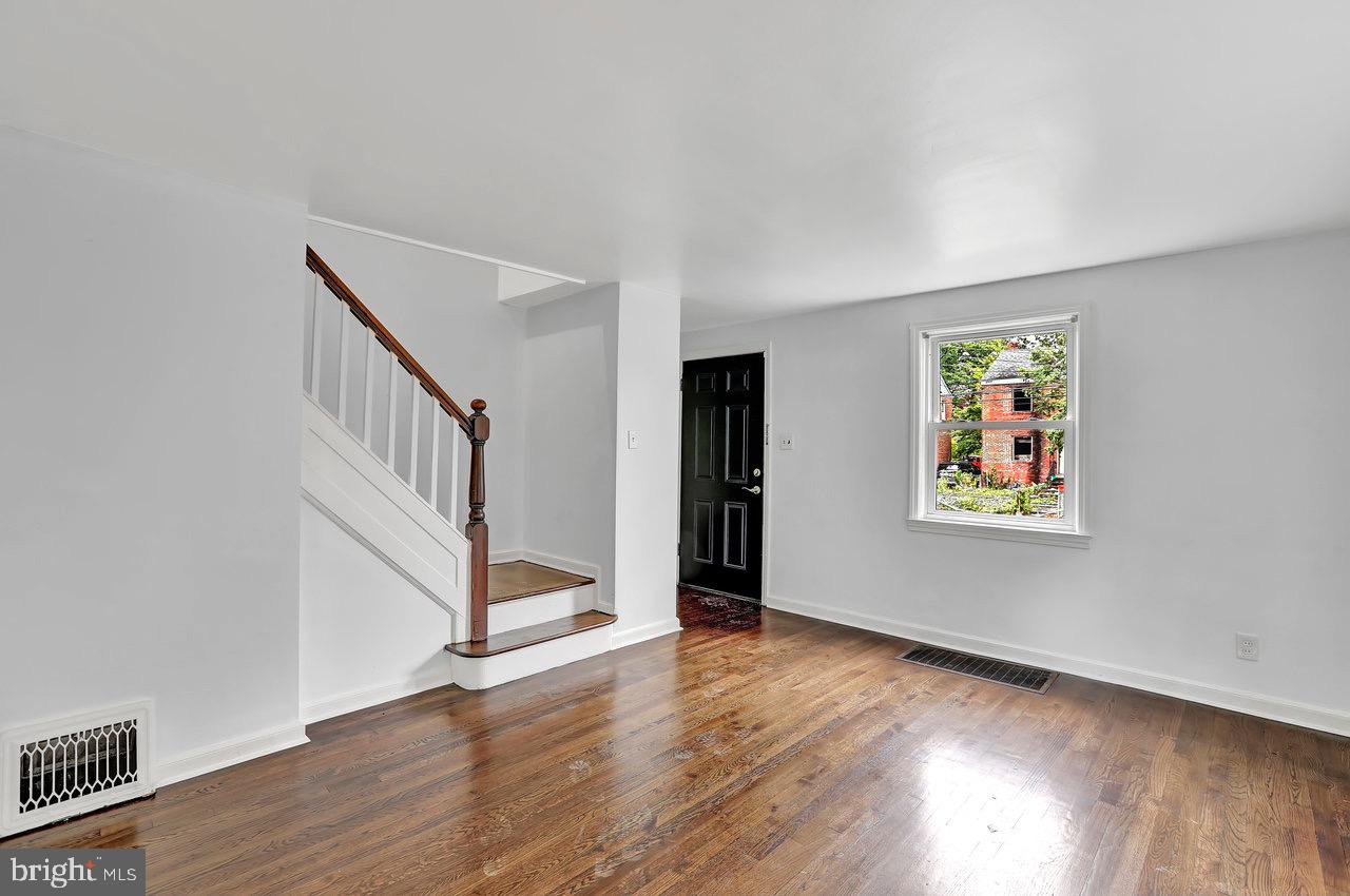 331 Oakland Street Ewing, NJ 08618 - Photo 4 of 21 a view of an entryway with wooden floor