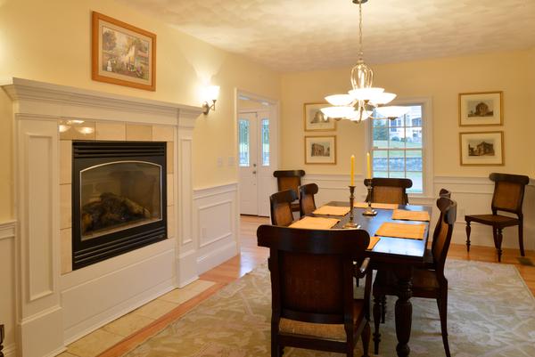 10 Towne Road Middleton, MA 01949 - Photo 12 of 30 a dining room with furniture a chandelier and wooden floor