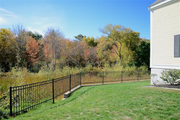 10 Towne Road Middleton, MA 01949 - Photo 2 of 30 a view of a yard with large trees