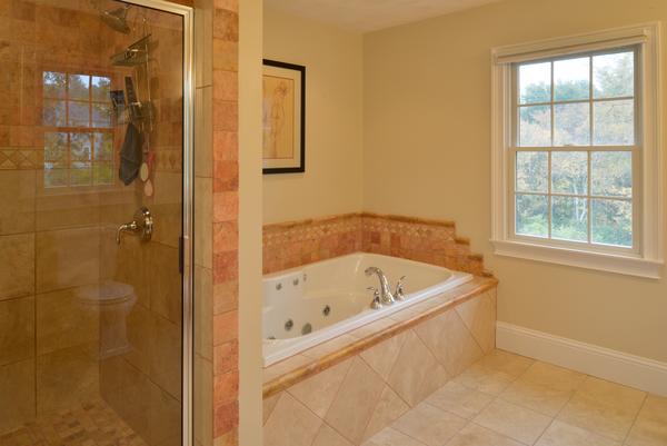 10 Towne Road Middleton, MA 01949 - Photo 22 of 30 a bath tub sitting next to a window
