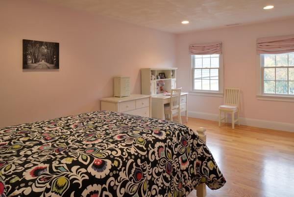10 Towne Road Middleton, MA 01949 - Photo 24 of 30 a bedroom with a bed and wooden floor