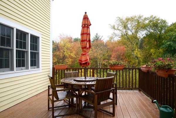 10 Towne Road Middleton, MA 01949 - Photo 30 of 30 a view of a chairs and table on the deck