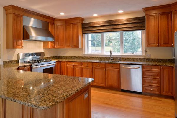 10 Towne Road Middleton, MA 01949 - Photo 6 of 30 a kitchen with granite countertop a stove sink and cabinets
