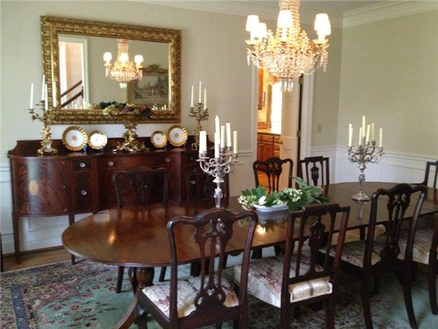 3301 Wimbledon Road Nashville, TN 37215 - Photo 5 of 9 Dining Room features high ceilings, exquisite crystal chandelier, hardwood floors, wainscoting, deep moldings.