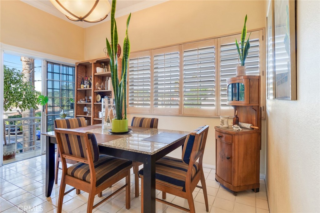 4220 Toland Way Los Angeles, CA 90065 - Photo 11 of 49 a view of a dining room with furniture and window