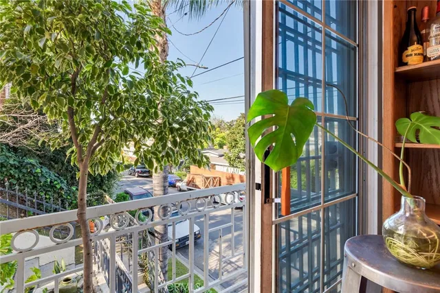 a kitchen with granite countertop a stove and a sink