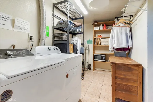 a view of multiple houses with yard