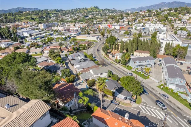 an aerial view of a city with lots of residential buildings