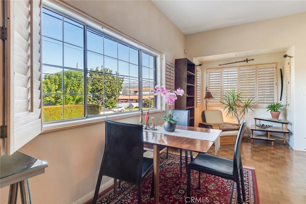 4220 Toland Way Los Angeles, CA 90065 - Photo 9 of 49 a dining room with furniture and wooden floor