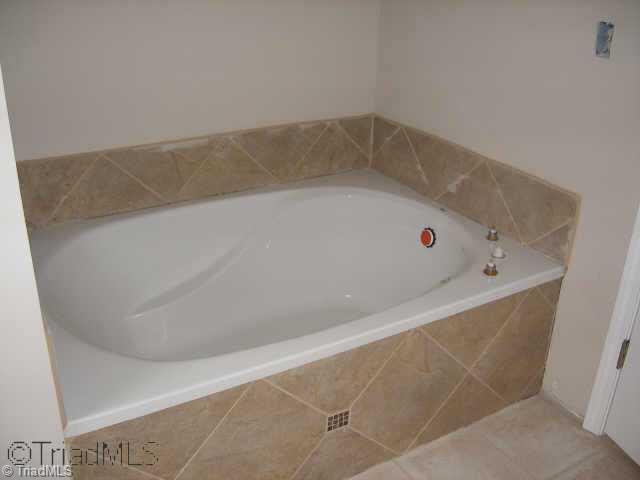 210 Link Road Reidsville, NC 27320 - Photo 5 of 7 Other. Master bath with tile surround