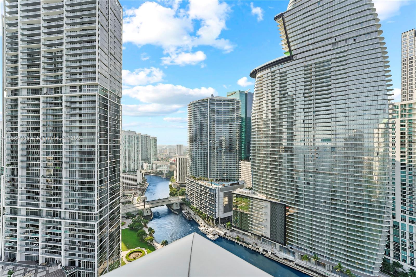 901 Brickell Key Boulevard, Unit 3504 Miami, FL 33131 - Photo 28 of 44 a bathroom with a toilet sink and shower