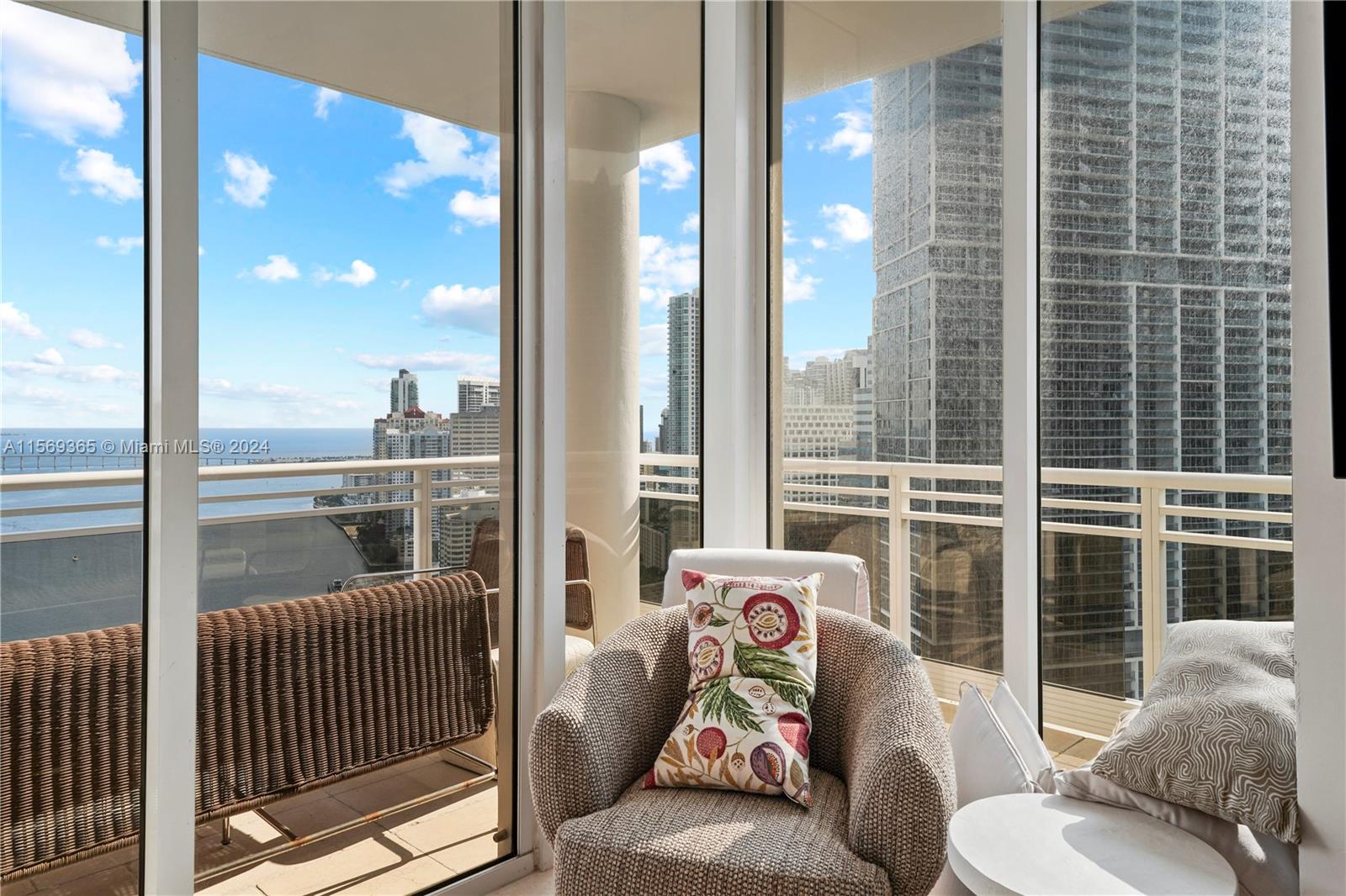 901 Brickell Key Boulevard, Unit 3504 Miami, FL 33131 - Photo 30 of 44 a living room with furniture