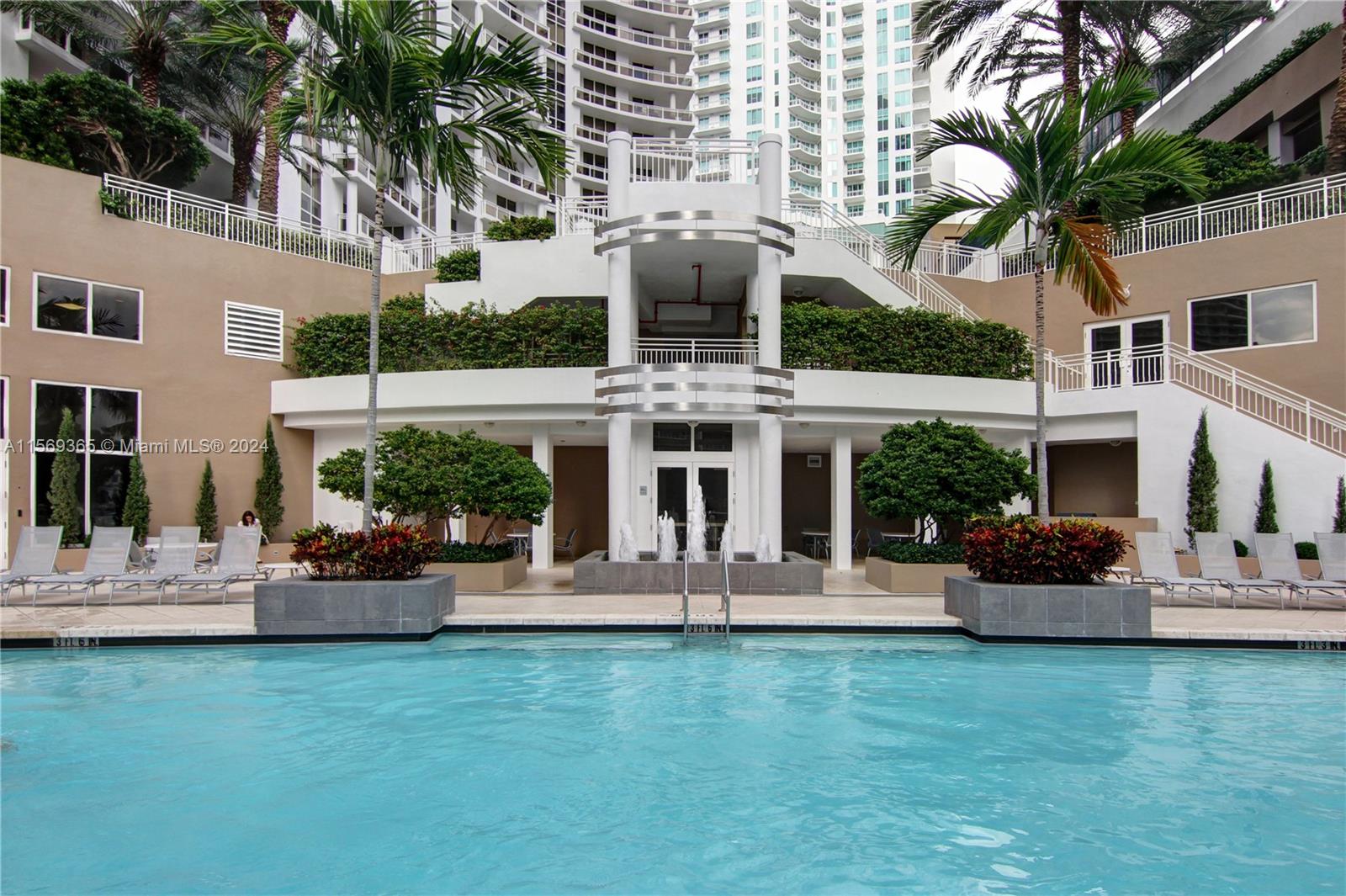 901 Brickell Key Boulevard, Unit 3504 Miami, FL 33131 - Photo 40 of 44 a front view of a house with patio