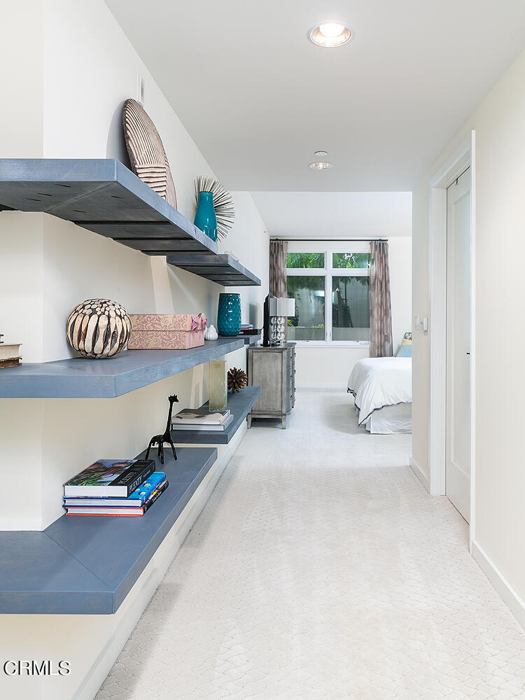 920 Granite Drive, Unit 103 Pasadena, CA 91101 - Photo 12 of 33 a living room with furniture and a large window