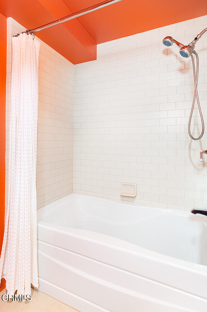 920 Granite Drive, Unit 103 Pasadena, CA 91101 - Photo 19 of 33 a bathroom with a bathtub and a shower