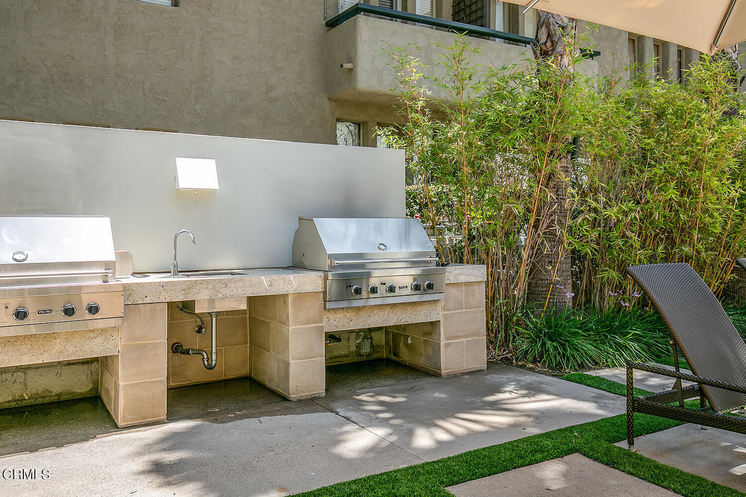 920 Granite Drive, Unit 103 Pasadena, CA 91101 - Photo 30 of 33 a view of a kitchen with a stove and a chair