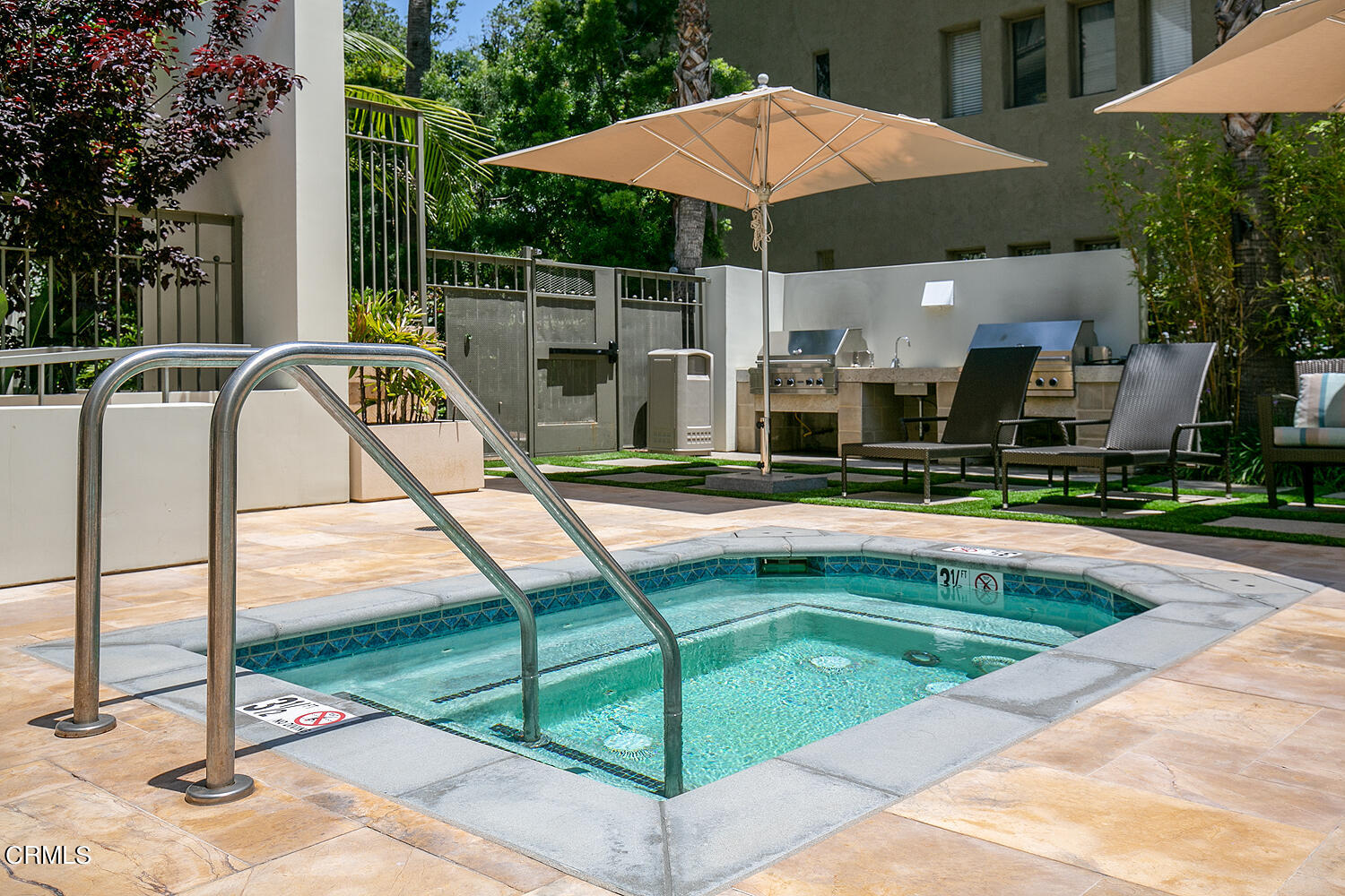 920 Granite Drive, Unit 103 Pasadena, CA 91101 - Photo 32 of 33 a view of swimming pool with chairs