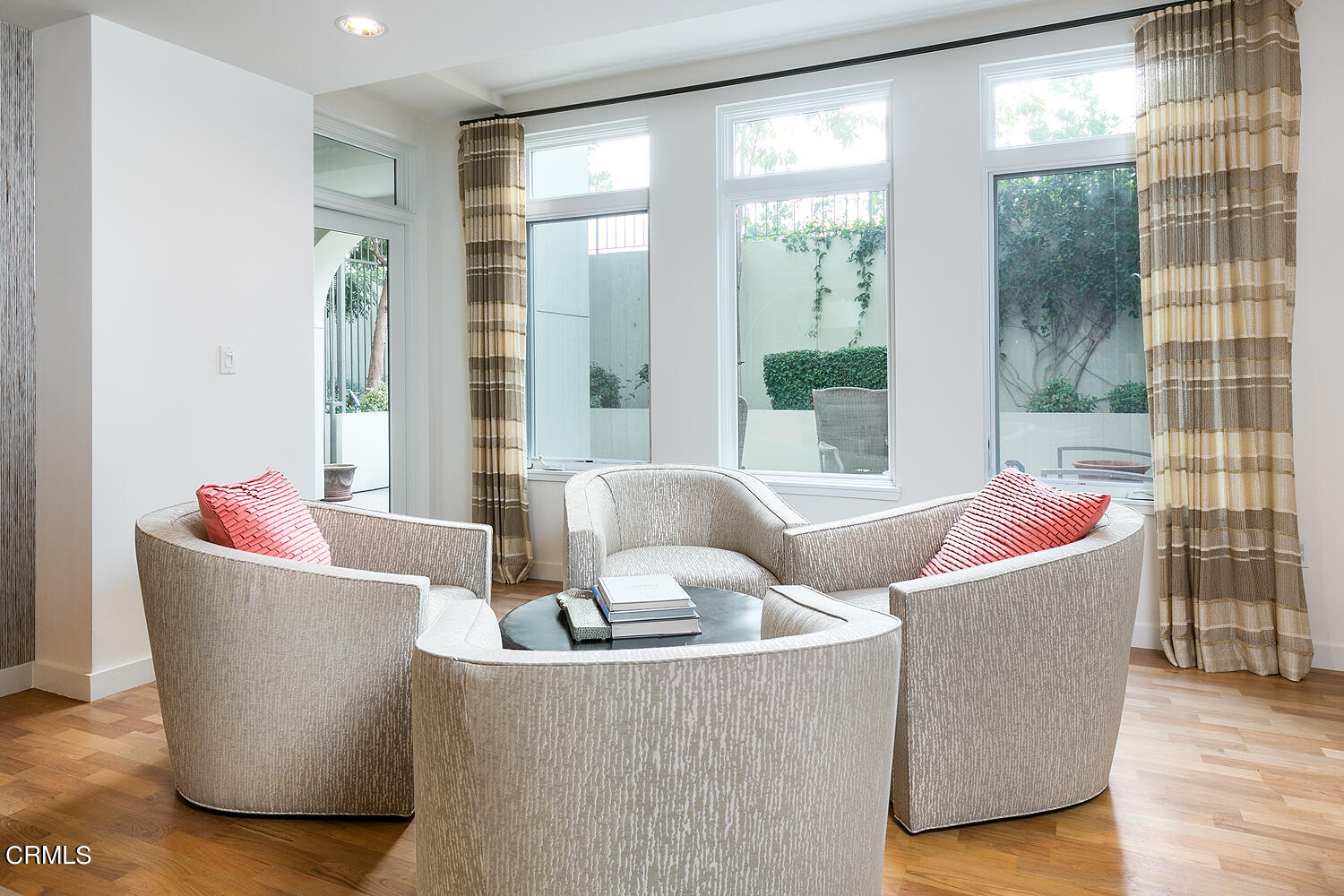 920 Granite Drive, Unit 103 Pasadena, CA 91101 - Photo 8 of 33 a living room with a couch and a large window